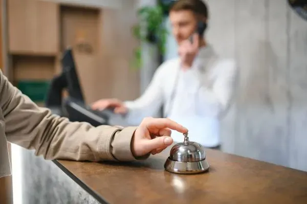 Someone using hotel bell