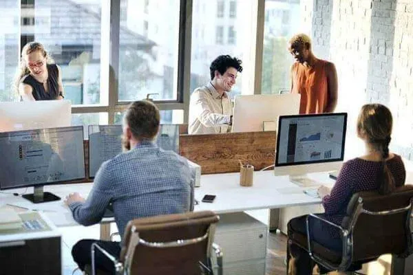 Group of people working together in an office