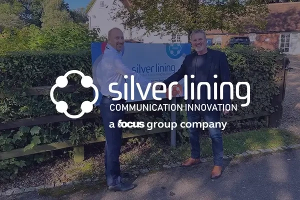 Silver Lining logo over image of two men shaking hands