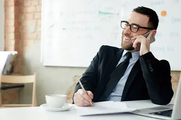 Man making a mobile call using a 3cx phone extension