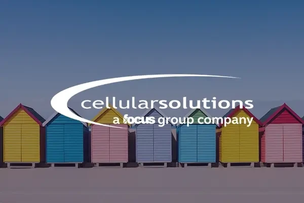 Cellular Solutions logo over beach huts