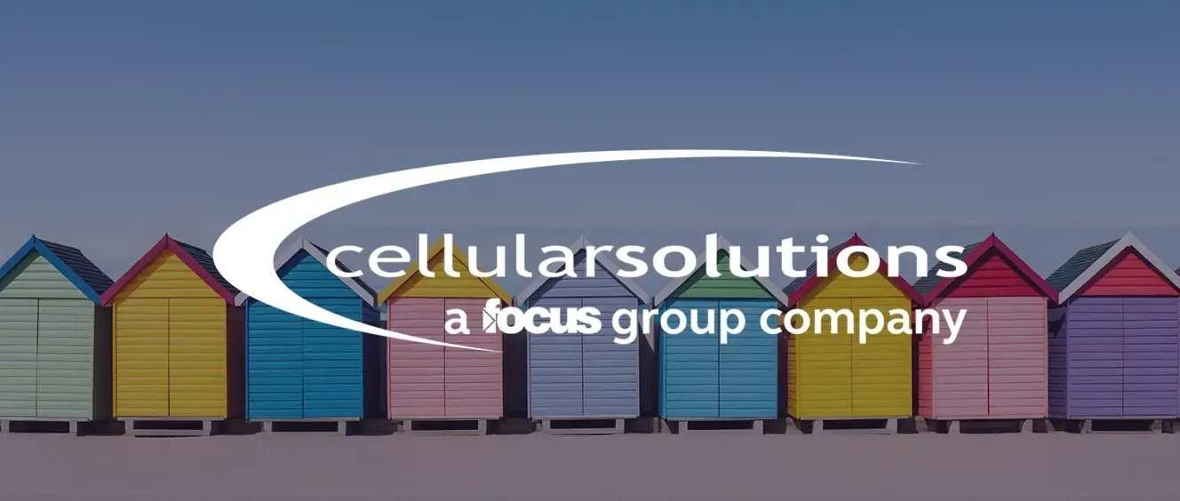 Cellular Solutions logo over beach huts