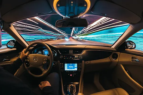 Long exposure shot with person driving car