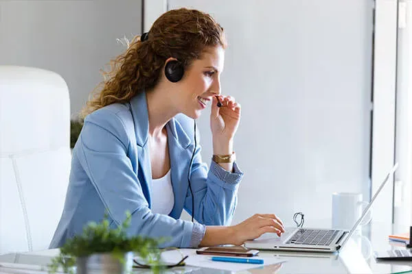 Woman on a video call at her home desk