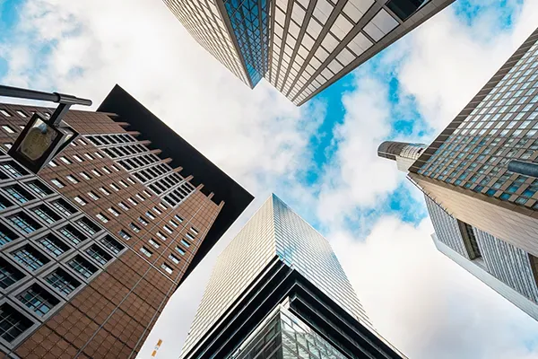 Shot of high-rise buildings with clouds