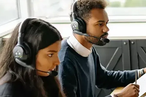 Man and woman with headset on