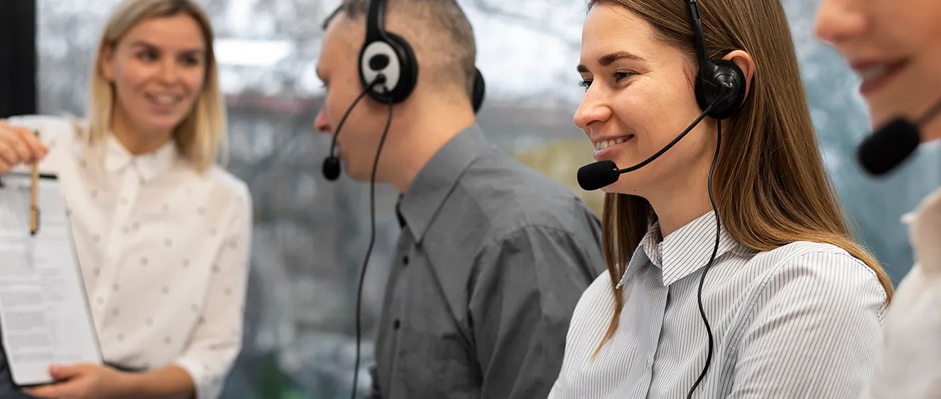 Woman smiling with headset microphone up to mouth