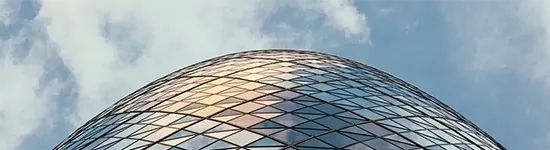 Side of curved glass skyscraper