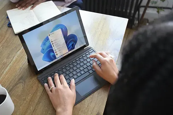 Microsoft Teams phone system application Laptop with Microsoft Team phone system open on contacts list