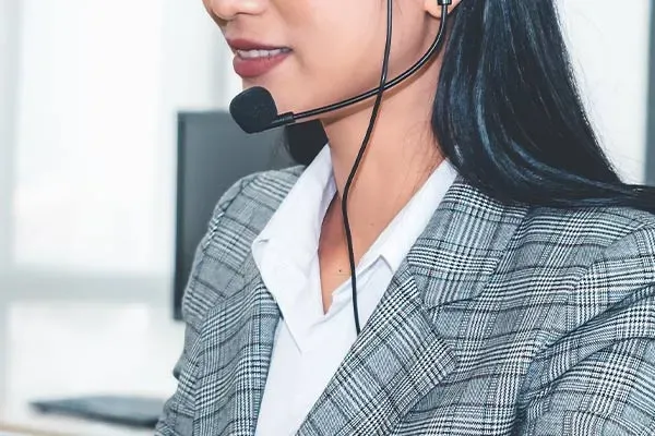 Woman making a SIP trunking call on a headset