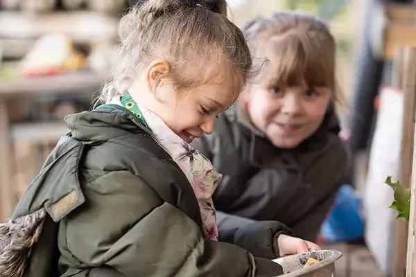 Two children playing outside