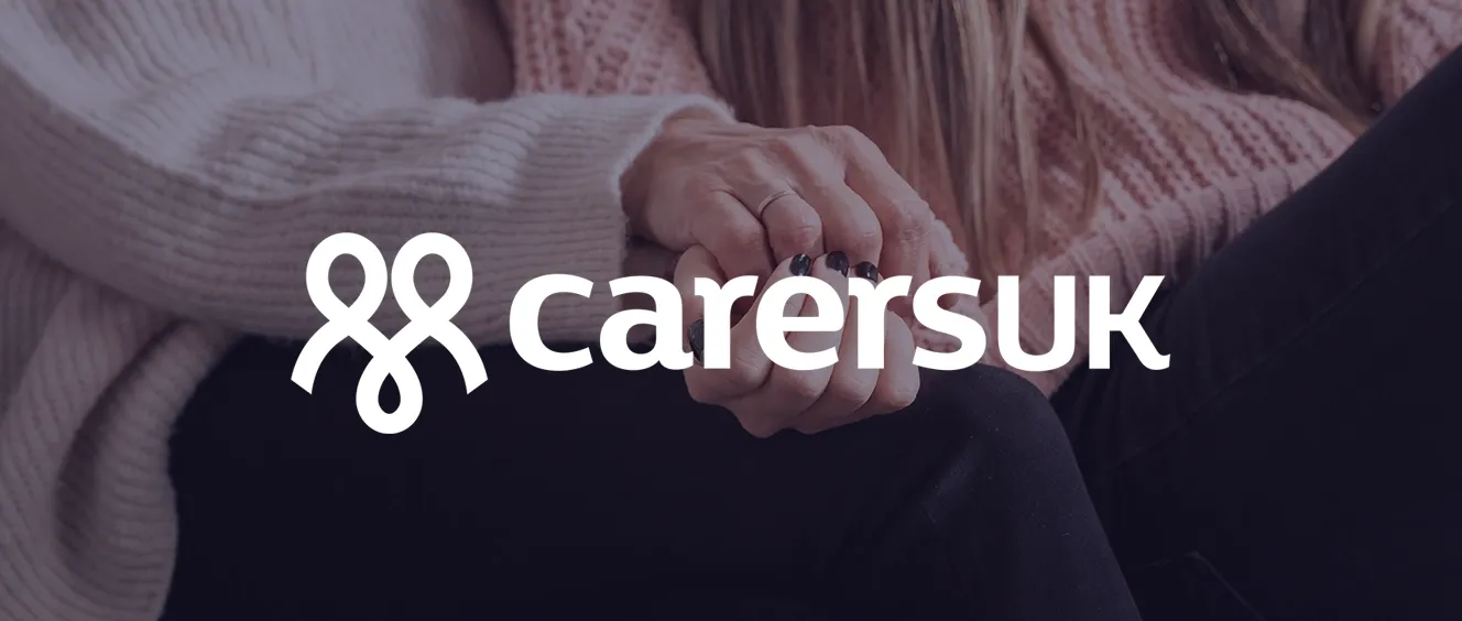 Carers UK logo over image of people holding hands